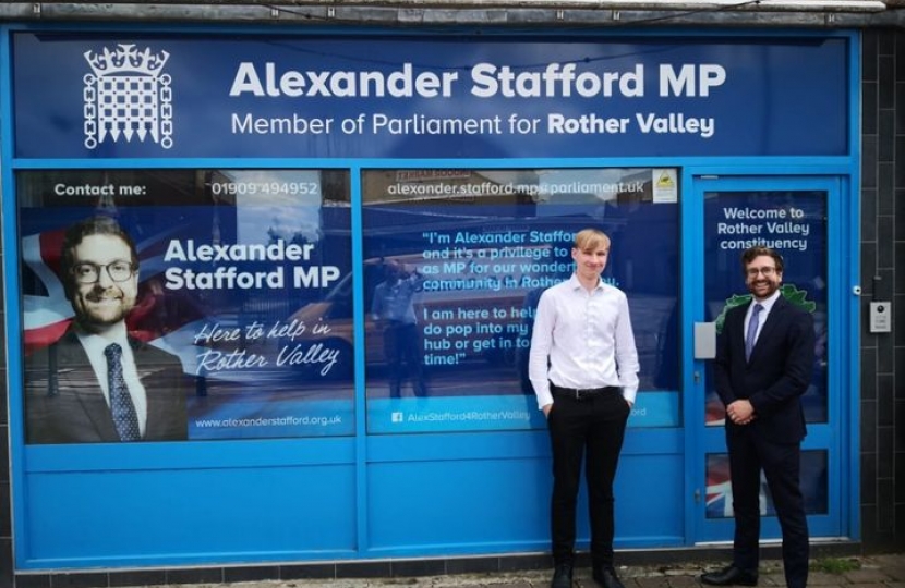Alexander Stafford MP outside his constituency office with student Rowen