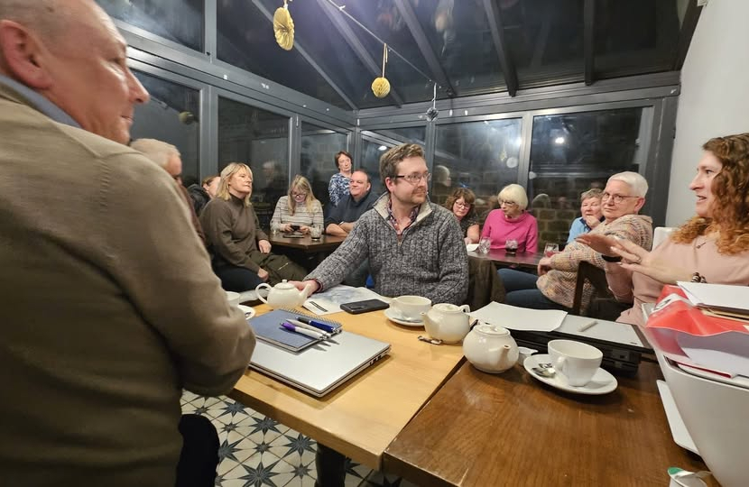 Meeting in the Rising Deer to discuss solar farm