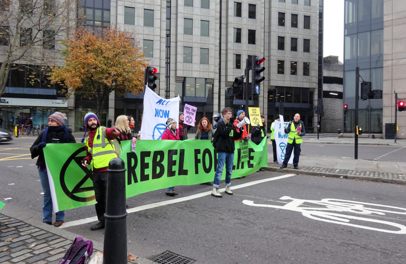"File:London November 23 2018 (23) Extinction Rebellion Protest Tower Hill.jpg" by DAVID HOLT is licensed under CC BY 2.0.