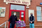 Alexander distributes Ribena with Postmaster Andy Bhullar