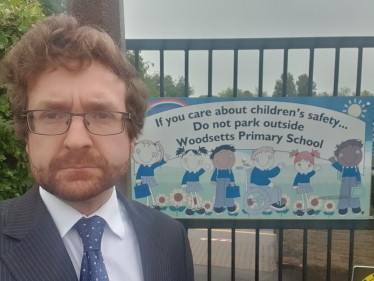 Alexander Stafford MP outside Woodsetts Primary School