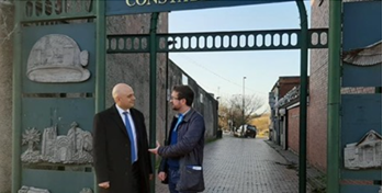 Alexander Stafford speaks to Home Secretary Sajid Javid outside Constable Lane in Dinnington