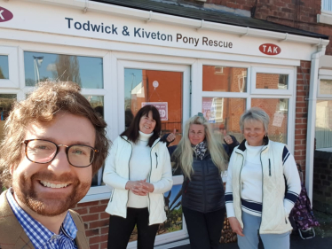 Alexander stafford outside TAK with three others