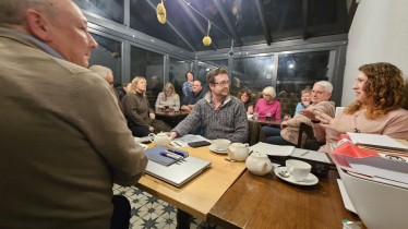 Meeting in the Rising Deer to discuss solar farm